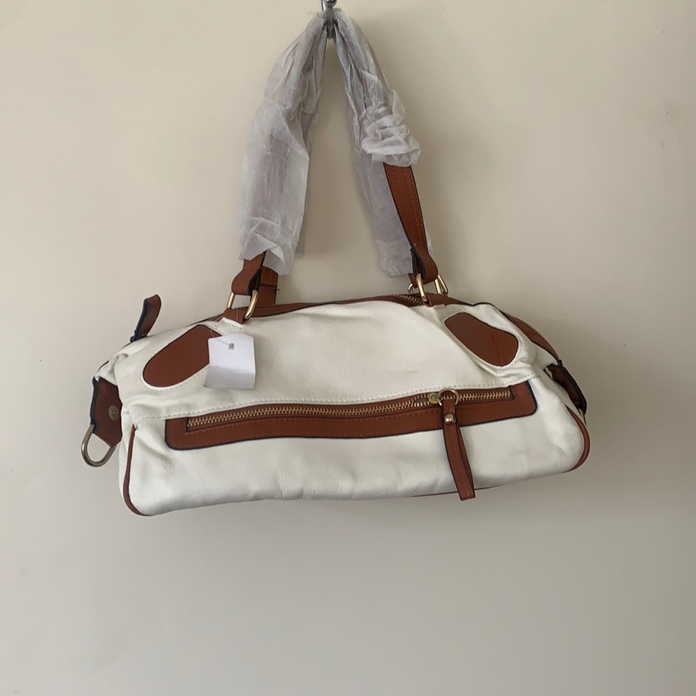 White and brown leather handbag